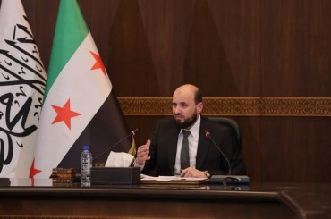 اجتماع وزراء الثورة في حكومة الإنقاذ السورية برئاسة المهندس محمد البشير مع حكومة النظام المخلوع لتحد